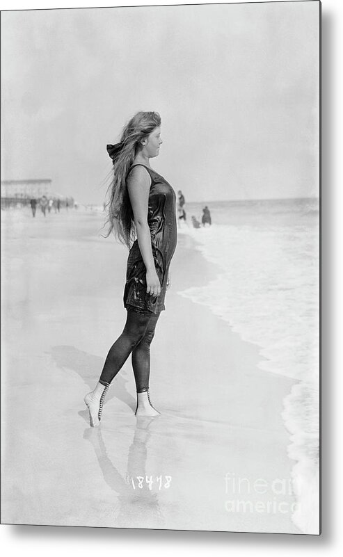 People Metal Print featuring the photograph Profile Of Young Woman On Beach by Bettmann