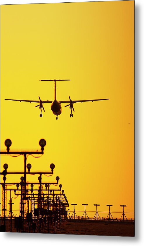 Clear Sky Metal Print featuring the photograph Turboprop Commercial Airplane Landing by Brian Stablyk