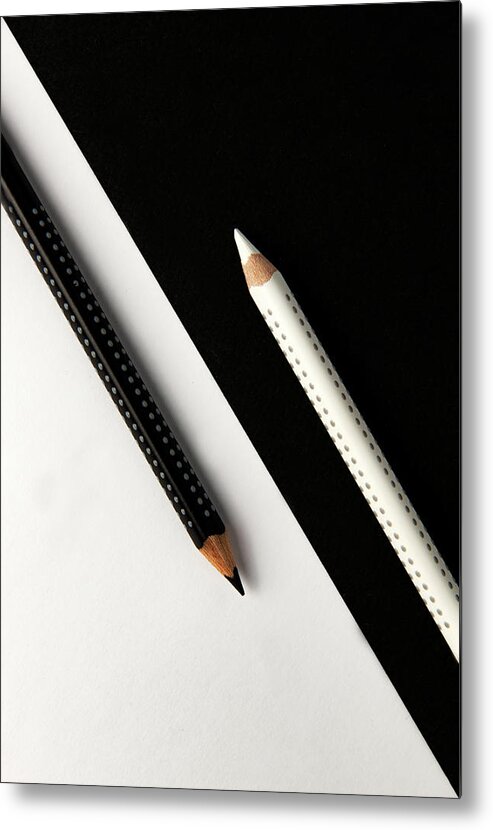 Pencil Metal Print featuring the photograph Two drawing pencils on a black and white surface. by Michalakis Ppalis