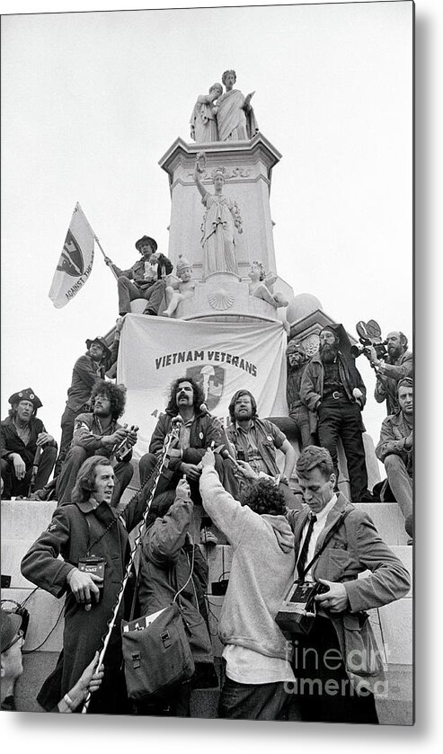 Vietnam War Metal Print featuring the photograph War Protesters Standing In Front by Bettmann