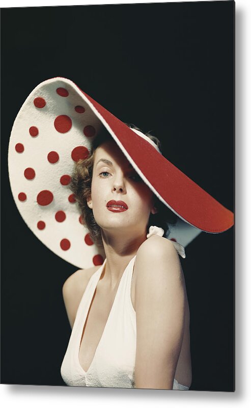 People Metal Print featuring the photograph Woman Wearing Large Spotted Hat by Tom Kelley Archive