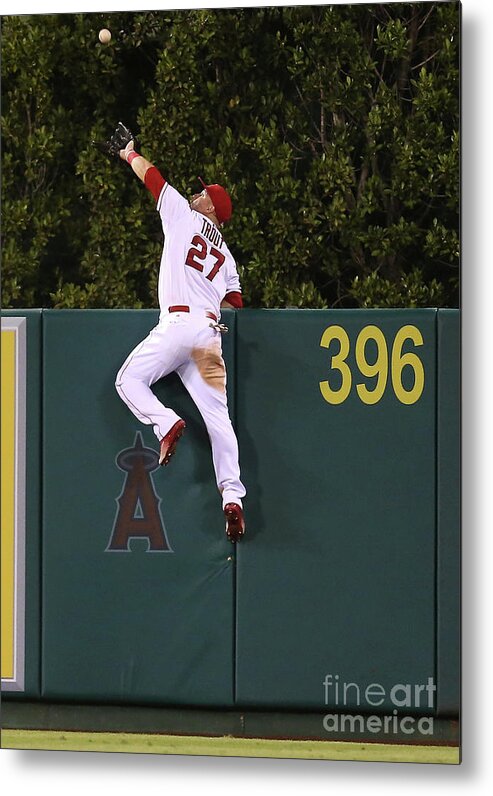 People Metal Print featuring the photograph Jesus Montero and Mike Trout by Stephen Dunn