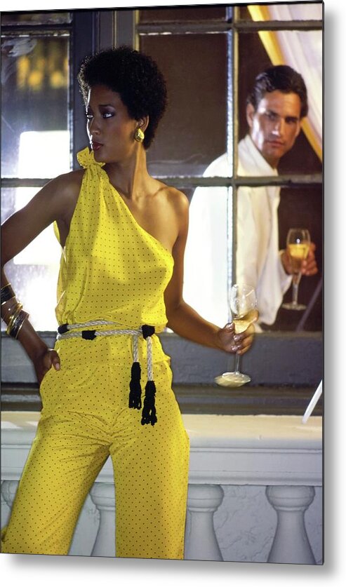 Fashion Metal Print featuring the photograph Peggy Dillard Wearing A Yellow One Shoulder Jumpsuit by Guy Le Baube