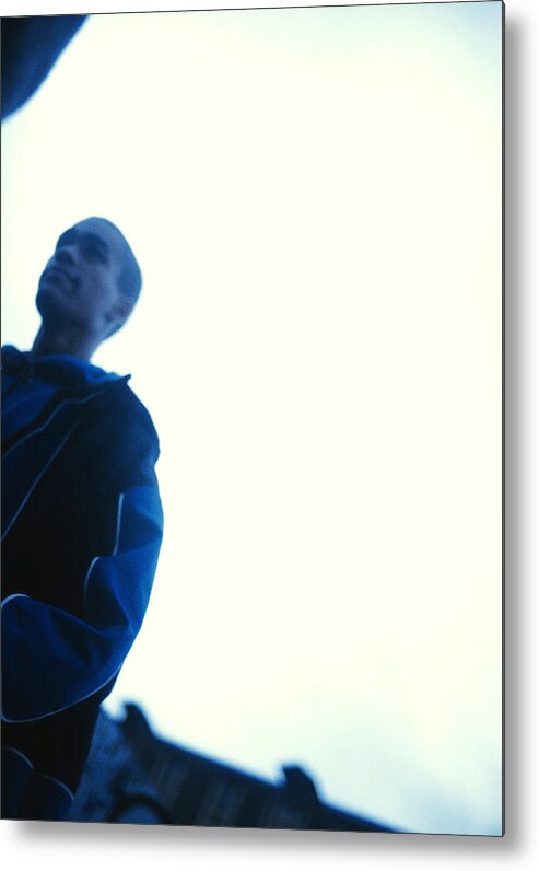 Grainy Metal Print featuring the photograph Profile of a male teenager in blue, blurred by Patrick Sheandell O'Carroll