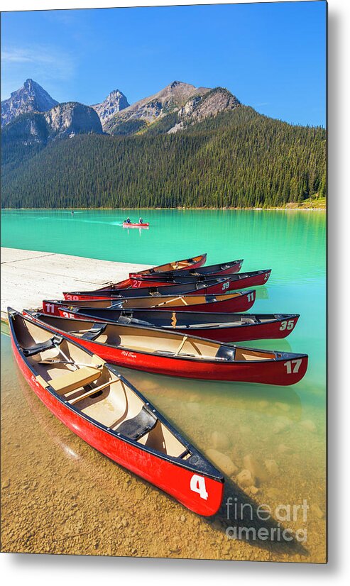 Red Canoes Metal Print featuring the photograph Red Canoes on Lake Louise, Banff national Park, Alberta, Canada by Neale And Judith Clark