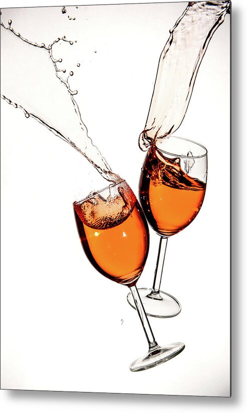 Alcohol Metal Print featuring the photograph Red wine in glasses with splashes on a white background isolated by Michalakis Ppalis