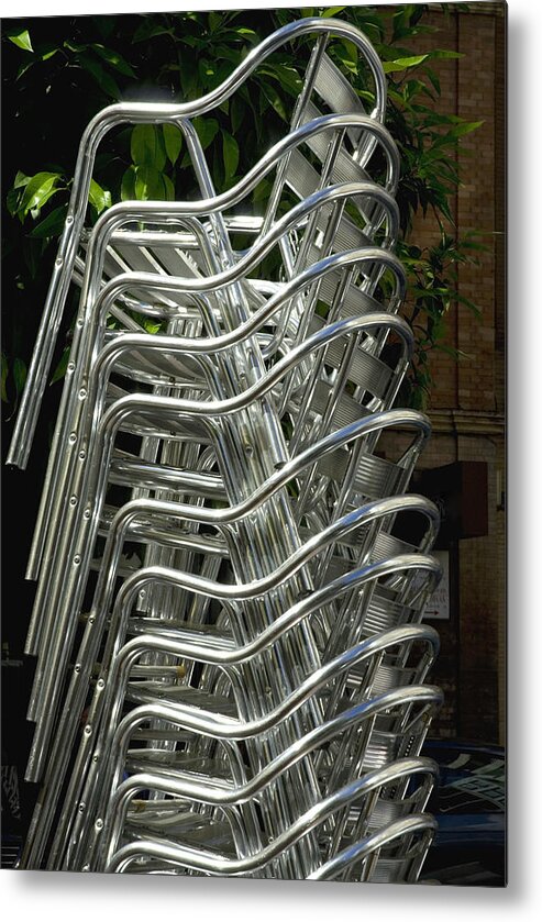 Large Group Of Objects Metal Print featuring the photograph Stacked aluminium cafe chairs by Lyn Holly Coorg