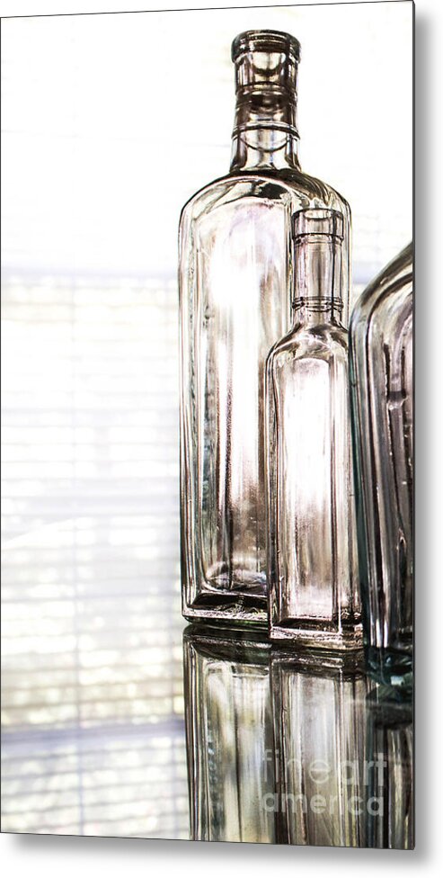 Bottles Metal Print featuring the photograph The Glow of Glass by Arlene Carmel