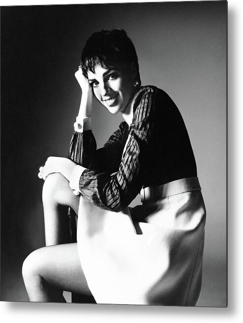 Actress Metal Print featuring the photograph Liza Minnelli Wearing A Gino Charles Dress by Bert Stern