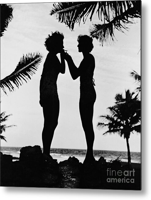 Silhouettes On The Shore Metal Print featuring the photograph Silhouettes on the Shore by Padre Art