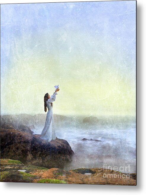 Woman Metal Print featuring the photograph Young Lady Releasing a Dove by the Sea by Jill Battaglia