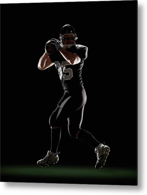 Sports Helmet Metal Print featuring the photograph Quarterback In Three-step Drop Position by Lewis Mulatero
