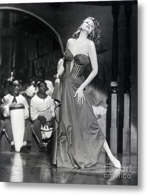 People Metal Print featuring the photograph Rita Hayworth Barefeet As She Sings by Bettmann