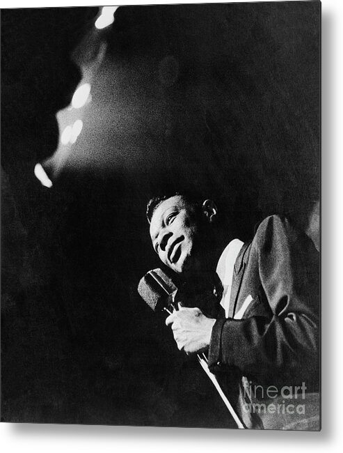 Singer Metal Print featuring the photograph Singer Nat King Cole Holding Microphone by Bettmann