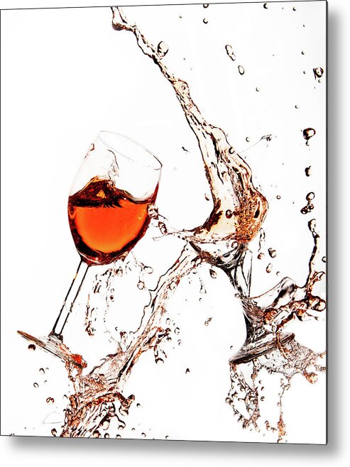 Damaged Metal Print featuring the photograph Broken wine glasses with wine splashes on a white background by Michalakis Ppalis