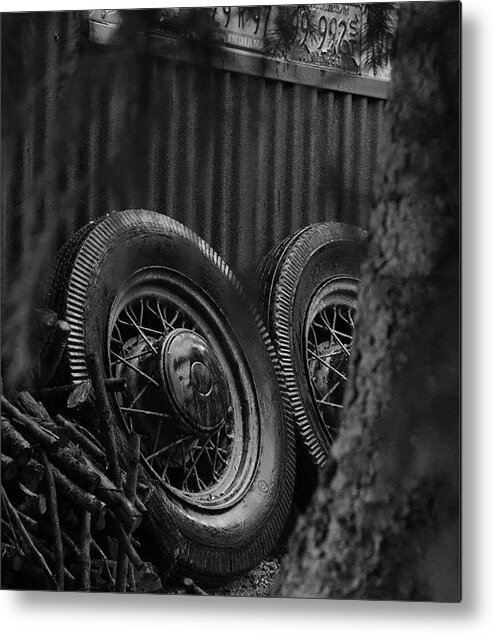 Black And White Metal Print featuring the photograph Old Tires in the Rain by Brian Howerton