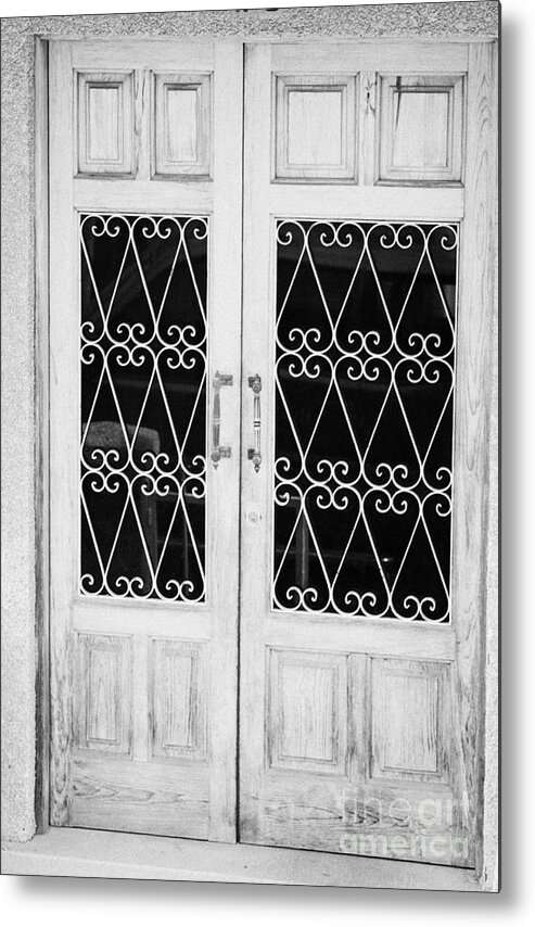 Europe Metal Print featuring the photograph double wooden doors with wrought iron decorative window guards Tenerife Canary Islands Spain by Joe Fox