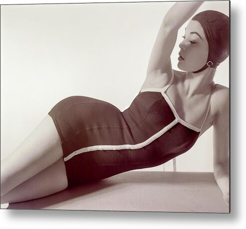 One-piece Swimsuit Metal Print featuring the photograph Jean Patchett Wearing A Sacony Swimsuit by Horst P. Horst