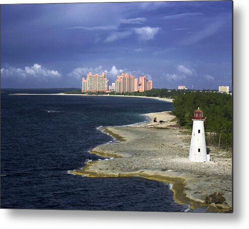 Atlantis Metal Print featuring the photograph Lighthouse on Colonial Beach with Atlantis Paradise Resort Bahamas by Jatin Thakkar