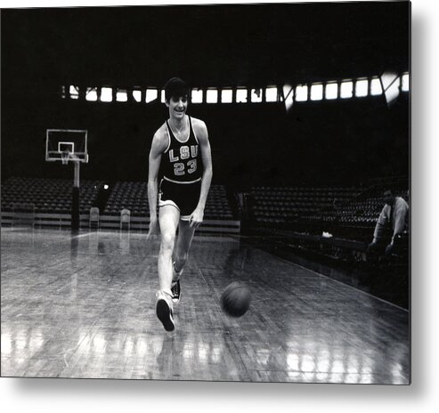 Classic Metal Print featuring the photograph Pete Maravich Dribbling Between Legs by Retro Images Archive