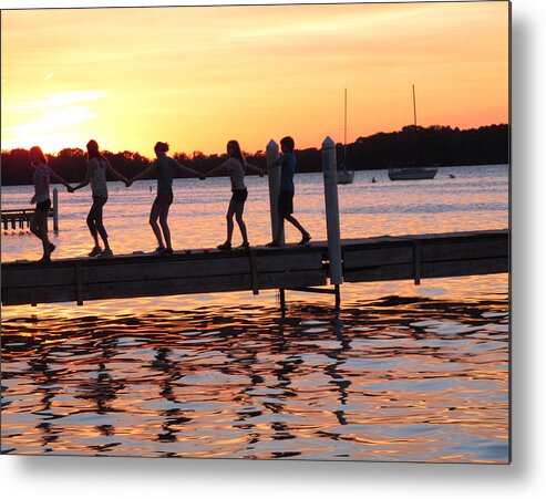 Pier Metal Print featuring the photograph Sunset Walkers by Tom Hefko