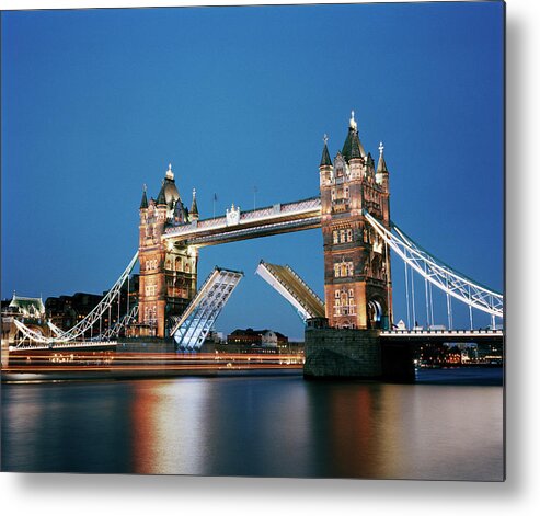 Drawbridge Metal Print featuring the photograph Tower Bridge At Dusk by Gary Yeowell