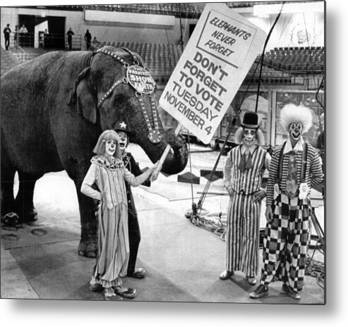 Classic Metal Print featuring the photograph Vintage Circus Clowns And Elephant by Retro Images Archive