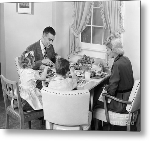 1950s Metal Print featuring the photograph Family Having Dinner, C.1950s by H. Armstrong Roberts/ClassicStock