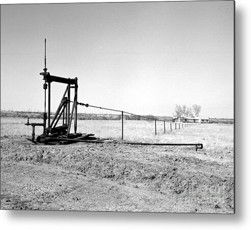 Oil Field Metal Print featuring the photograph Pumping Oil by Larry Keahey