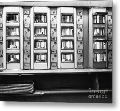1920s Metal Print featuring the photograph Vending Machines In An Automat, C. 1930s by H. Armstrong Roberts/ClassicStock