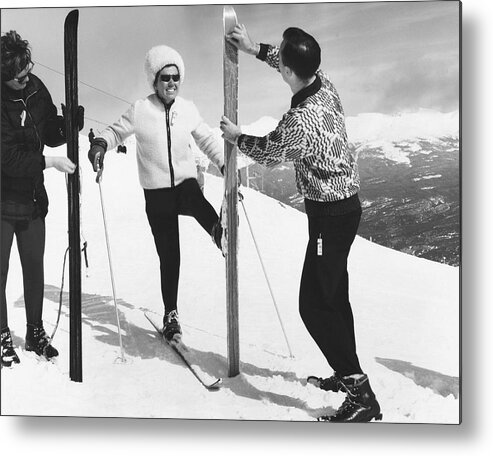 1960s Metal Print featuring the photograph Women Waxing Skis by Underwood Archives