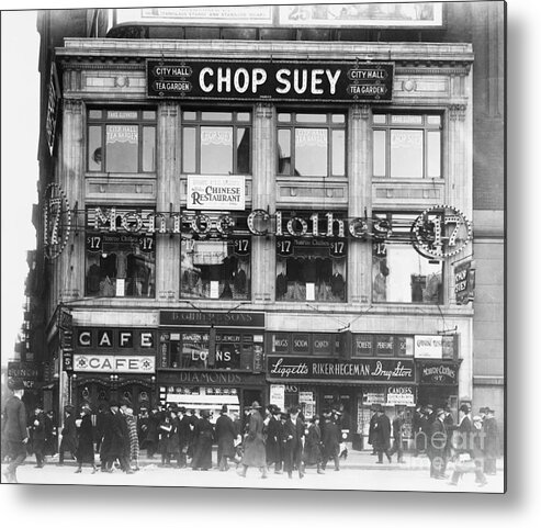 Art Metal Print featuring the photograph Advertisement Signs Covering Building by Bettmann