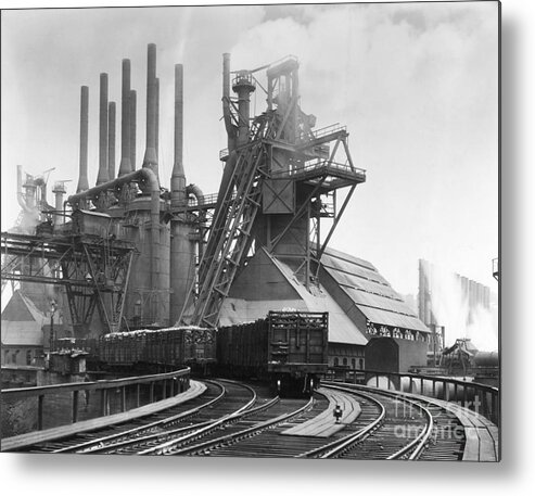 Furnace Metal Print featuring the photograph Blast Furnace Of The Carnegie Steel Corp by Bettmann