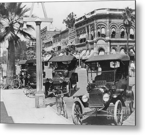 People Metal Print featuring the photograph Cars Parked Alongside Street by Bettmann
