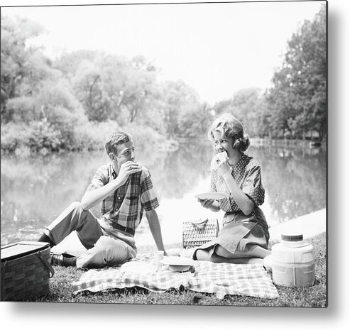 Young Men Metal Print featuring the photograph Couple Seated On Checkered Tablecloth by H. Armstrong Roberts