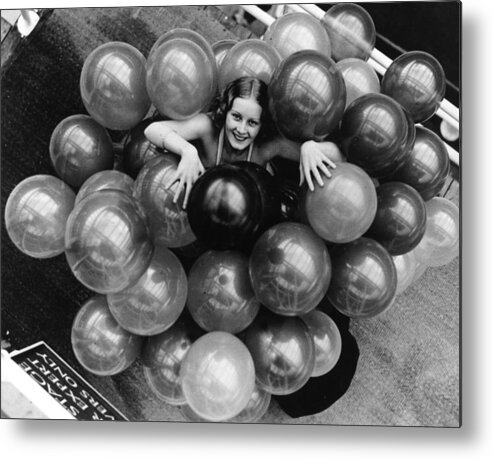 1930-1939 Metal Print featuring the photograph Float Of Balloons by Fox Photos