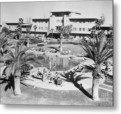 People Metal Print featuring the photograph Hotel Flamingo Patio And Swimming Pool by Bettmann