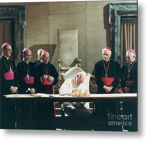 1980-1989 Metal Print featuring the photograph Pope John Paul II Signs Law by Bettmann