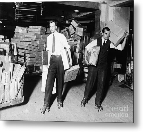 Working Metal Print featuring the photograph Roller Skating Mail Clerks by Bettmann