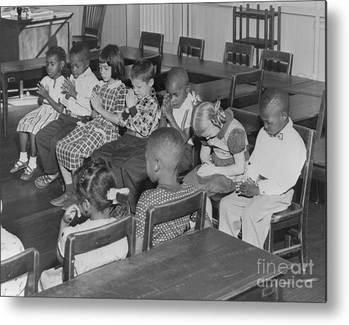 Education Metal Print featuring the photograph Students Praying In School by Bettmann