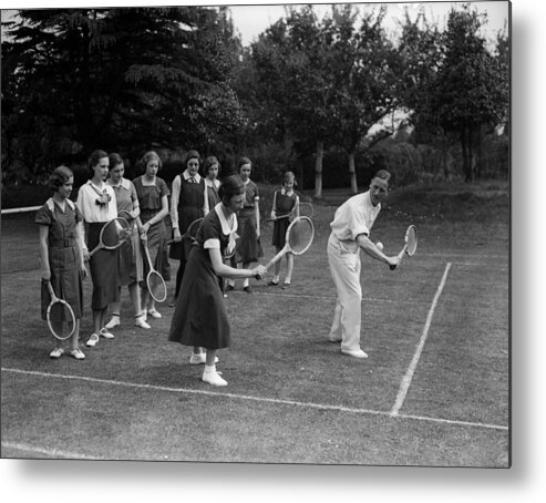 Tennis Metal Print featuring the photograph Tennis Lesson by Fox Photos