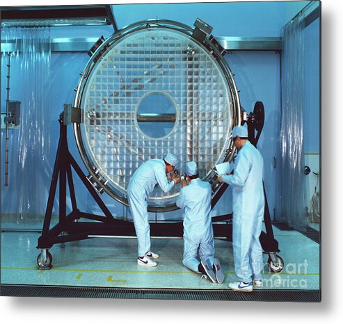 People Metal Print featuring the photograph Workers Polishing Hubble Telescope by Bettmann