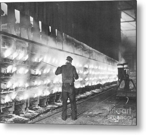 Working Metal Print featuring the photograph Workman Venting Condenser At Steel Plant by Bettmann