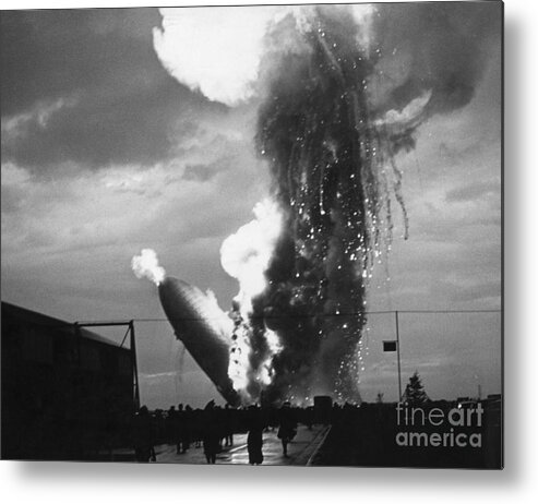 People Metal Print featuring the photograph Zeppelin Hindenburg Burning In Lakehurst by Bettmann