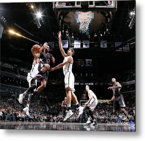Chris Paul Metal Print featuring the photograph Brook Lopez and Chris Paul by Nathaniel S. Butler