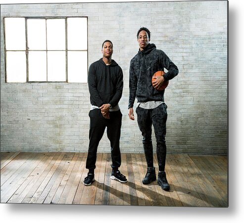 Nba Pro Basketball Metal Print featuring the photograph Demar Derozan and Kyle Lowry by Nathaniel S. Butler