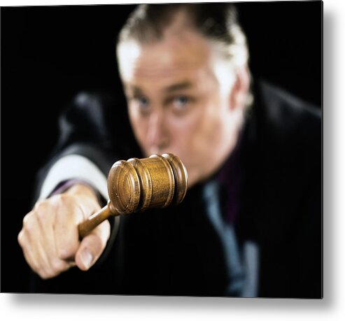 Guilt Metal Print featuring the photograph Gavel is held out as a threat by angry judge by RapidEye