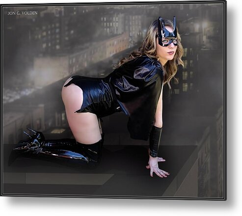 Bat Woman Metal Print featuring the photograph A Bat Heroine On The Ledge by Jon Volden