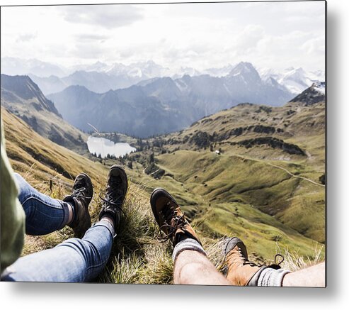Young Men Metal Print featuring the photograph Germany, Bavaria, Oberstdorf, legs of two hikers resting in alpine scenery by Westend61