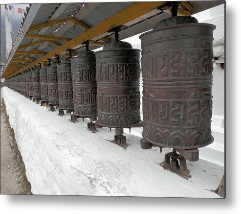 Prayer Wheels Metal Print featuring the photograph Prayer Wheels by Pema Hou